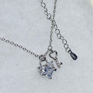 Elegant Sterling Silver Heart Necklace with Crystal Key Charm